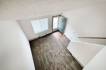 Vaulted ceilings (with ceiling fans) in loft apartment homes
